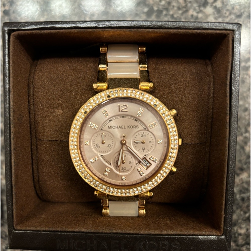 Rose gold Micheal Kors watch for women lightly worn